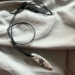 Elegant Black and White Surfboard Necklace
